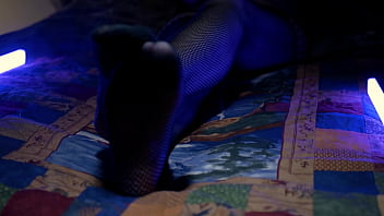 Perfect toes peeking through sexy fishnets