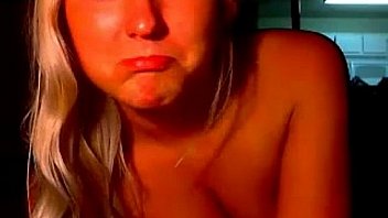 Horny blonde rubs her clit