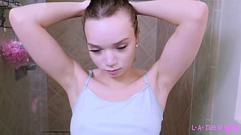 Timeless brunette beauty enjoys a sensual bath