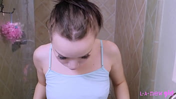 Timeless brunette beauty enjoys a sensual bath