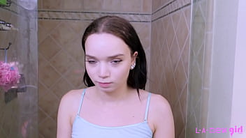 Timeless brunette beauty enjoys a sensual bath