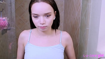 Timeless brunette beauty enjoys a sensual bath