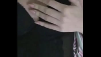 Big chick likes laying down on her bed and playing with her big milk jugs