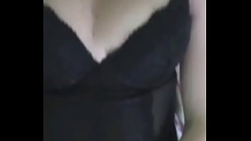 Big chick likes laying down on her bed and playing with her big milk jugs