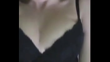 Big chick likes laying down on her bed and playing with her big milk jugs