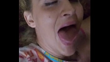 Cutie gets cum all over her face