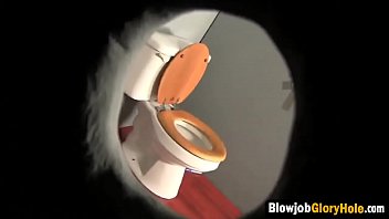 Big boobed redhead slut enjoys glory hole action