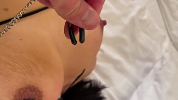 He play hard with my hard dark nipples squeezes and stretches when im bondage