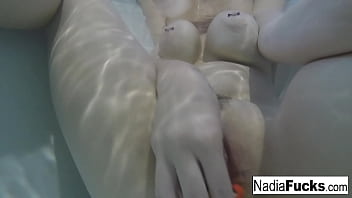 Blonde babe gets wet