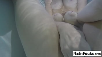 Blonde babe gets wet