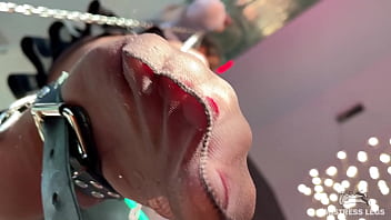 My foot in torn tan tights wiggling right above your face