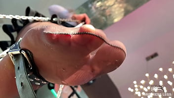 My foot in torn tan tights wiggling right above your face