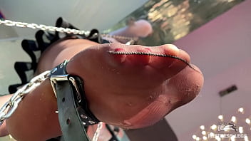 My foot in torn tan tights wiggling right above your face