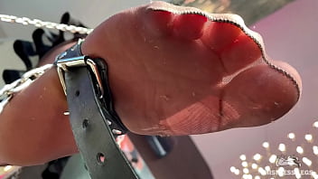 My foot in torn tan tights wiggling right above your face