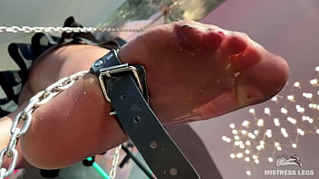 My foot in torn tan tights wiggling right above your face