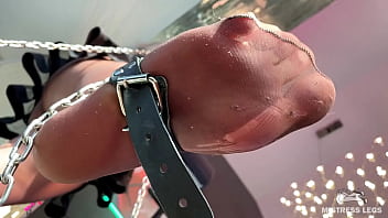 My foot in torn tan tights wiggling right above your face