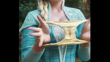 She's unraveling the chill with a playful tug where braids meet bold frozen fortress—this elsa beckons from the edge of enchanted edges