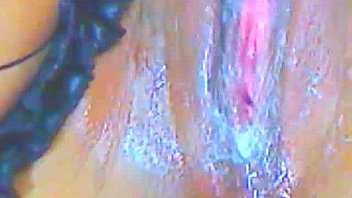 Hot and sexy brunette sucking on a dildo 2