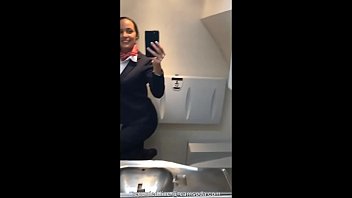 Latina stewardess joins the masturbation mile high club in the lavatory and cums