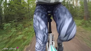 Cute girl with round ass deepthroats guy's cock during bike ride in the forest Cute girl with round ass deepthroats guy's cock during bike ride in the forest
