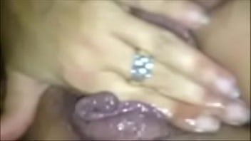Rubbing and fingering her extremely wet cunt