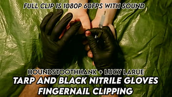 Tarp and black nitrile gloves fingernail clipping