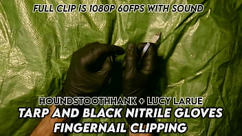 Tarp and black nitrile gloves fingernail clipping