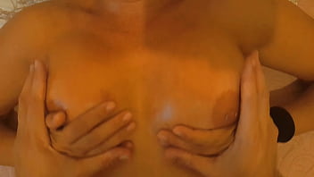 Stepmom massaging tits with cum