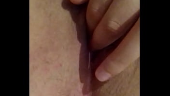 Busty brunette touches herself