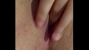 Busty brunette touches herself