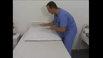 Male intern jacks off while watching female patient play with a dildo then fucks