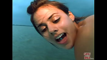 Petite brunette pleasure herself on a boat