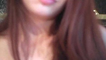 Awesome brunette hottie is stripping