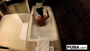 Brunette babe gets wet