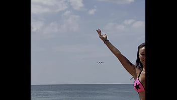 Monika fox poses in pink bikini with stars on beach free
