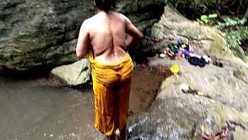 Old aunty was fucked in public while bathing in a pond in forest Old aunty was fucked in public while bathing in a pond in forest
