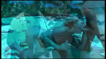 As she gives a blowjob the blonde haired crystal gets butt fucked