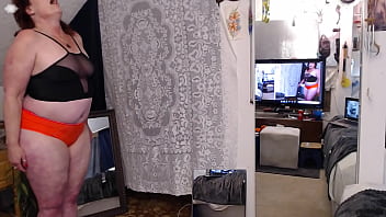 264 black top and orange shorts to wear exercising