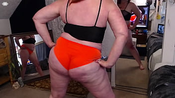 264 black top and orange shorts to wear exercising