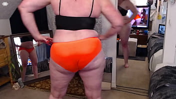 264 black top and orange shorts to wear exercising