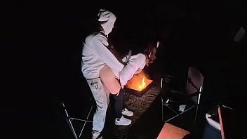 Using milf pussy at camp next to the fire