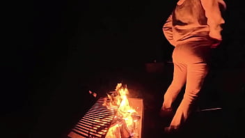 Using milf pussy at camp next to the fire
