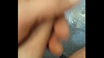 Solo cumshot in a glass