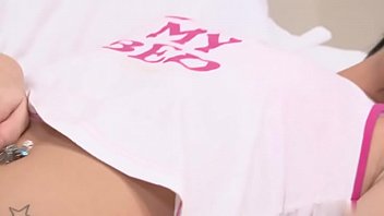 Gorgeous young bitch touches herself all over in bed