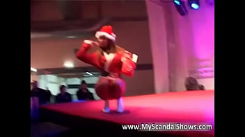 Great brunette babe in santas clothes