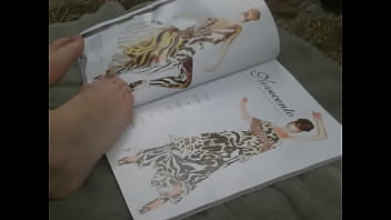 Flipping through magazine with feet