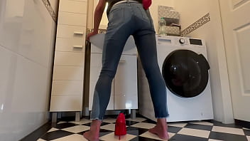 Wetting extremely jeans and red classic high heels and play with pee