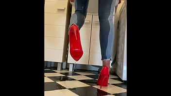 Wetting extremely jeans and red classic high heels and play with pee