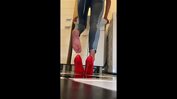 Wetting extremely jeans and red classic high heels and play with pee