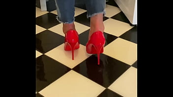 Wetting extremely jeans and red classic high heels and play with pee